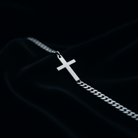 Pulsera de cruz plateada